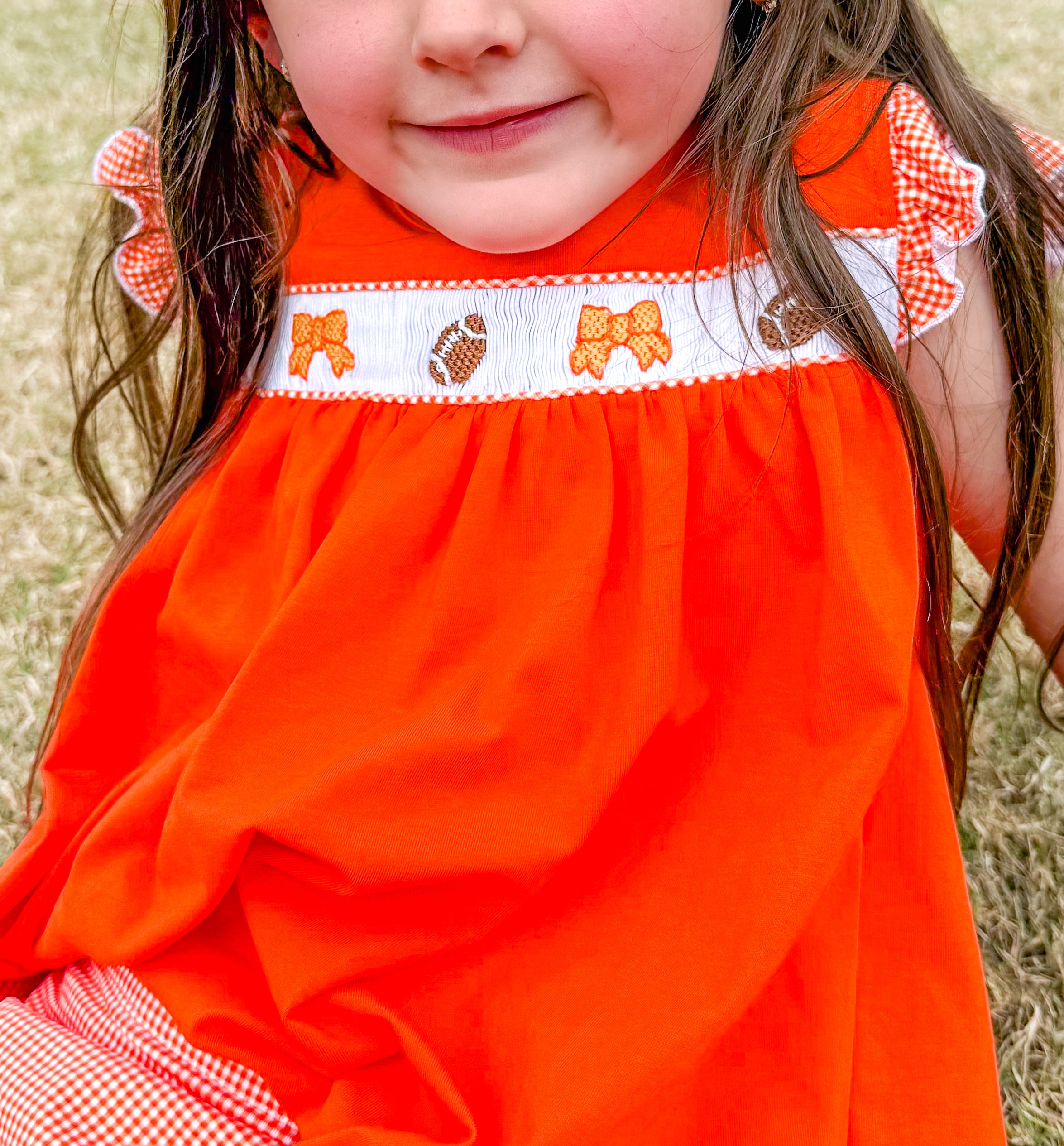 Orange Smocked Footballs and Bows Tie Skort