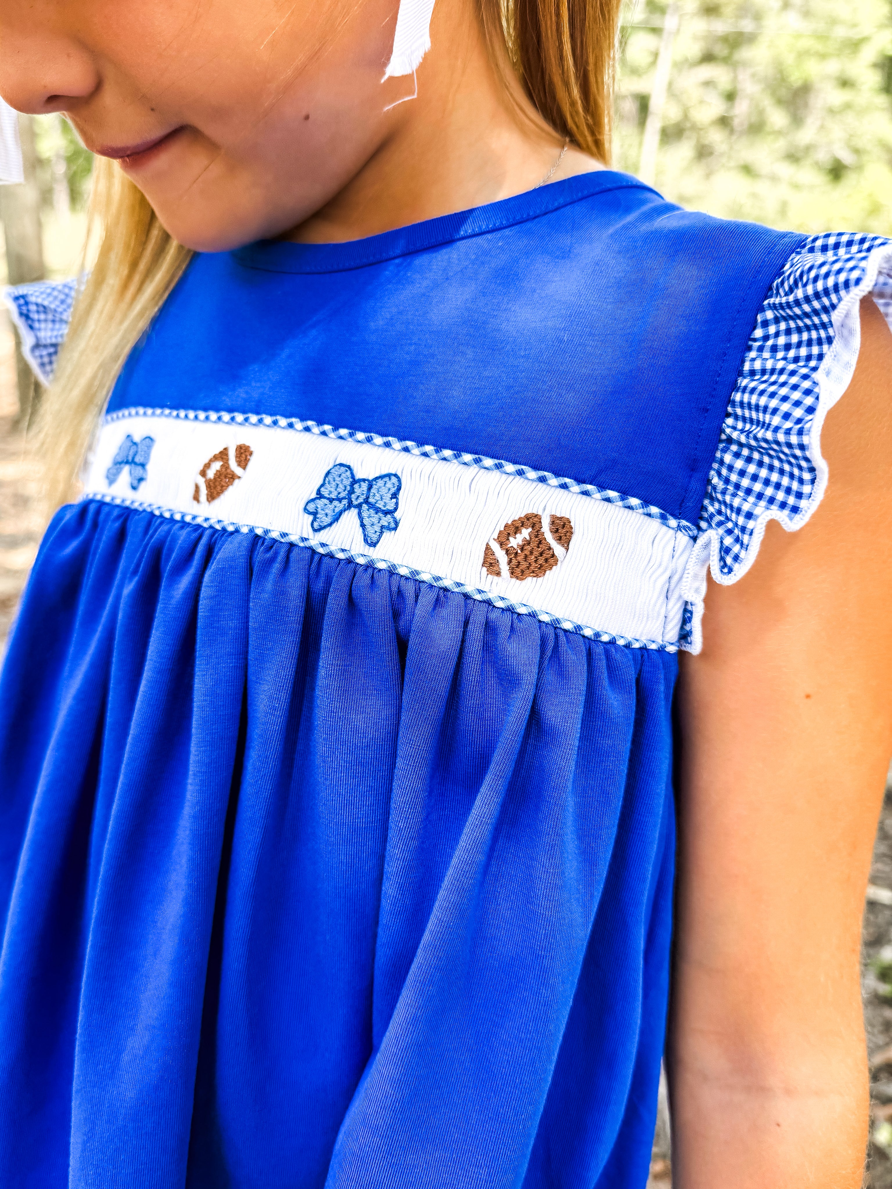 Royal Blue Smocked Footballs and Bows Tie Skort
