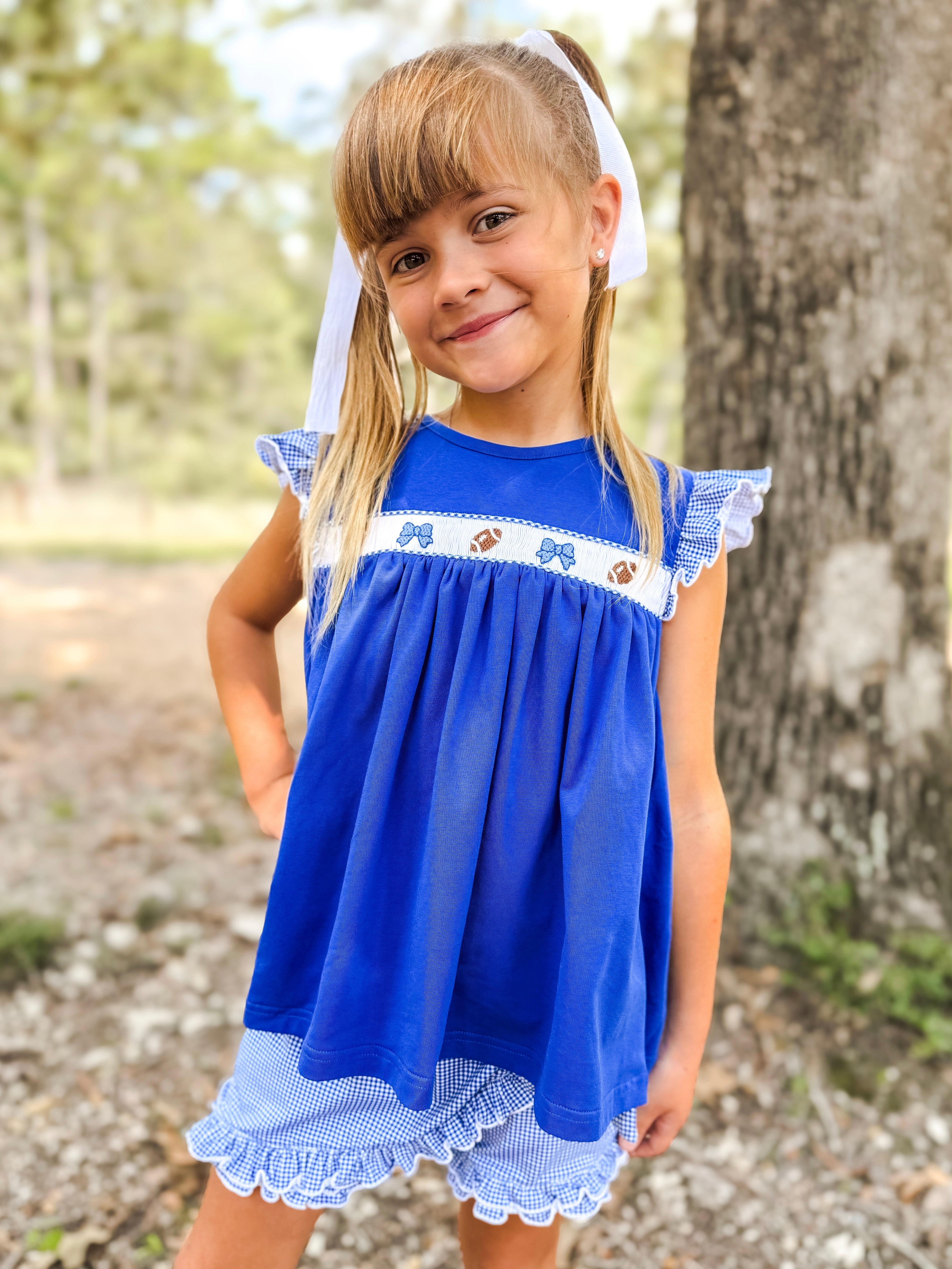 Royal Blue Smocked Footballs and Bows Tie Skort