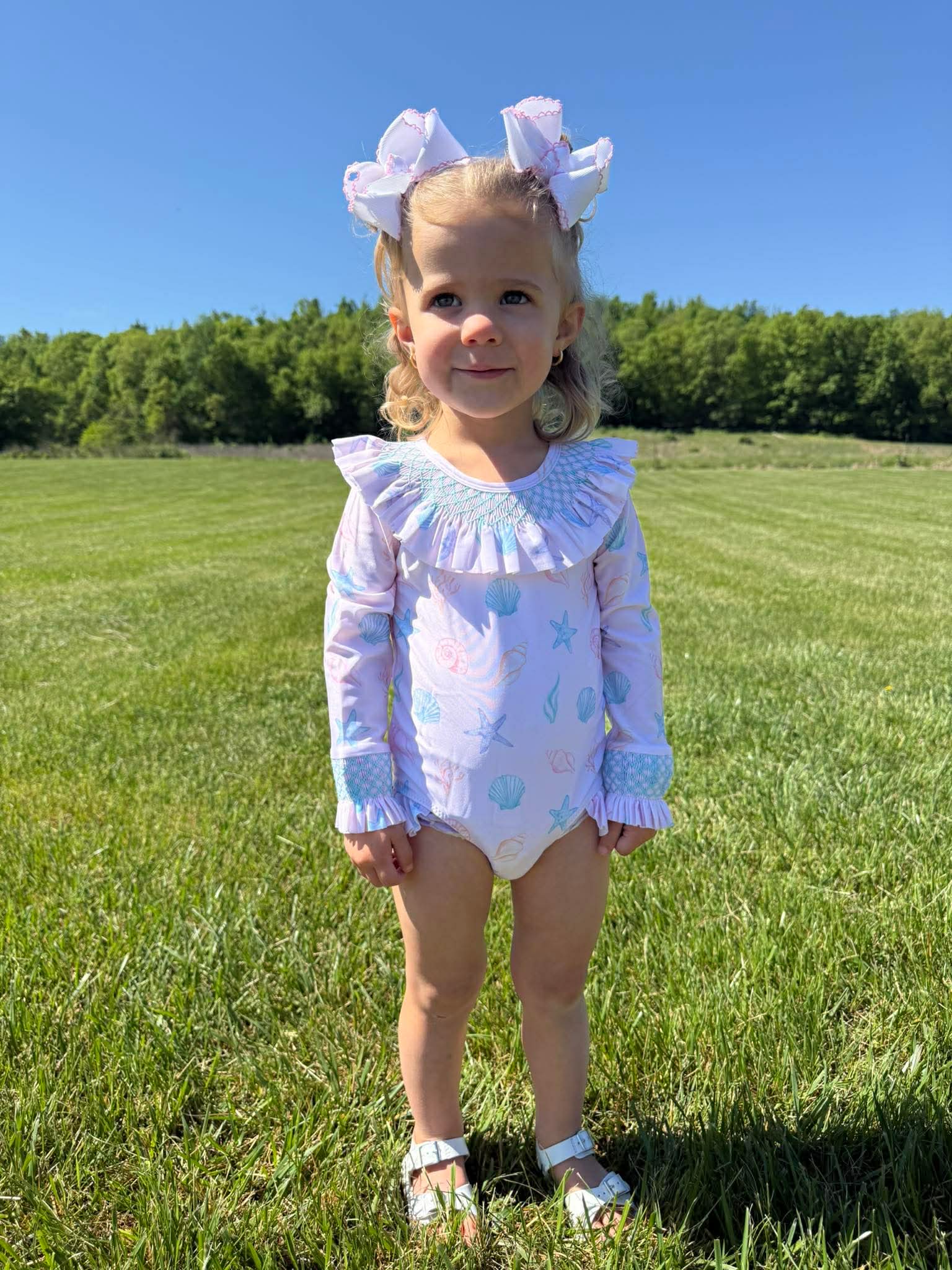 Girls Sally Sells Seashells Smocked Rashguard One Piece UPF 50+