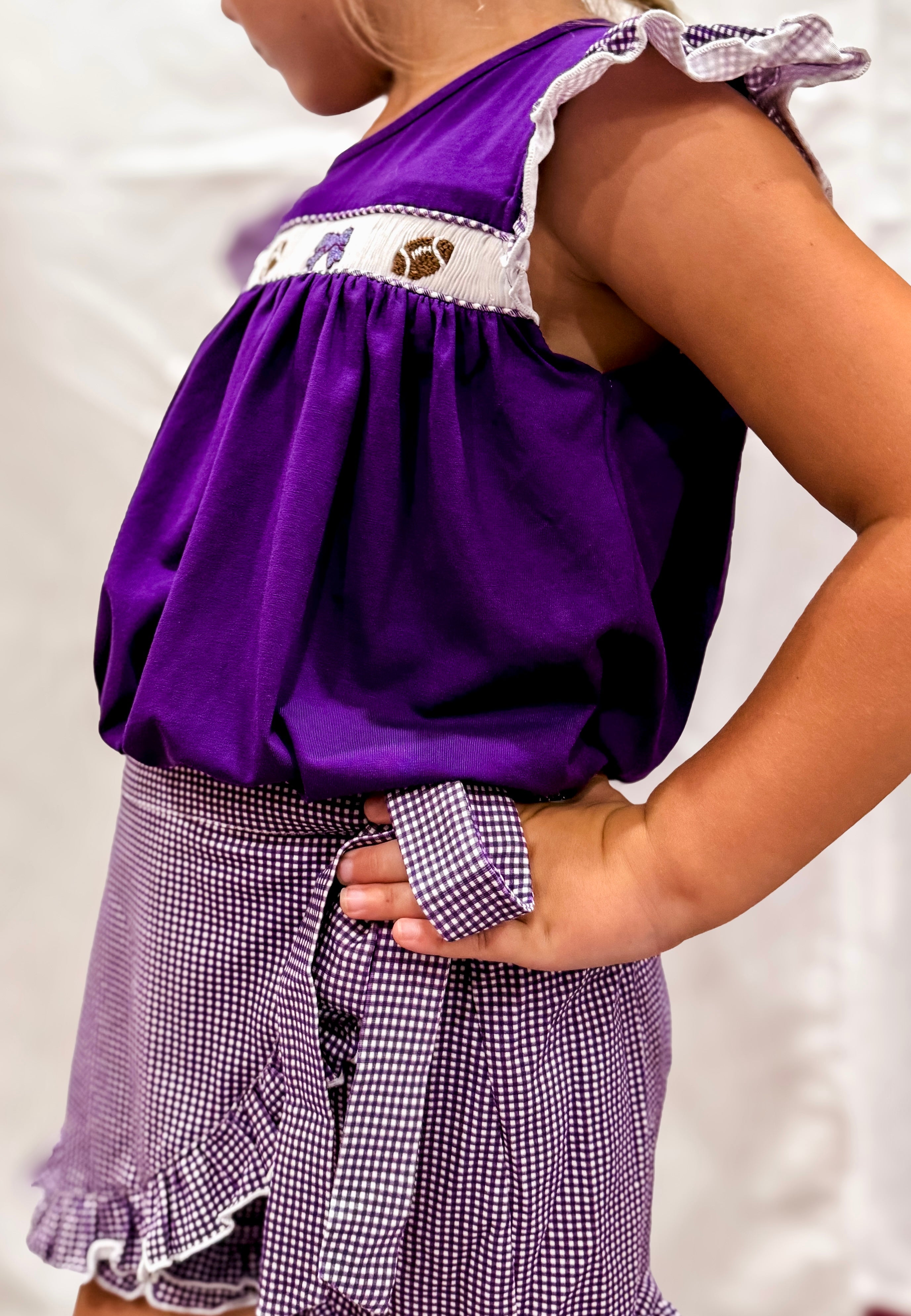Purple Smocked Footballs and Bows Tie Skort